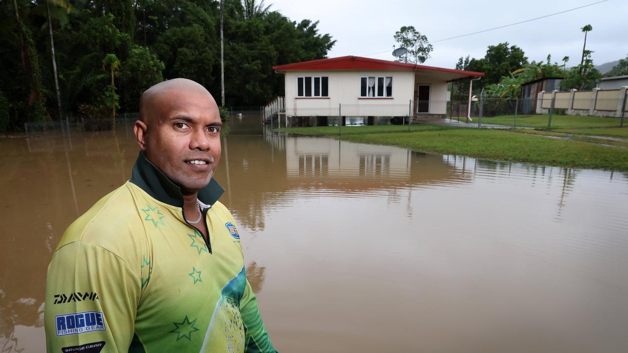 Harry Cobb’s father’s home at Mossman surrounded by floodwaters. Picture: Liam Kidston