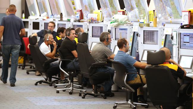 Air traffic controllers in the main control room at Brisbane Airport. Picture: Lyndon Mechielsen