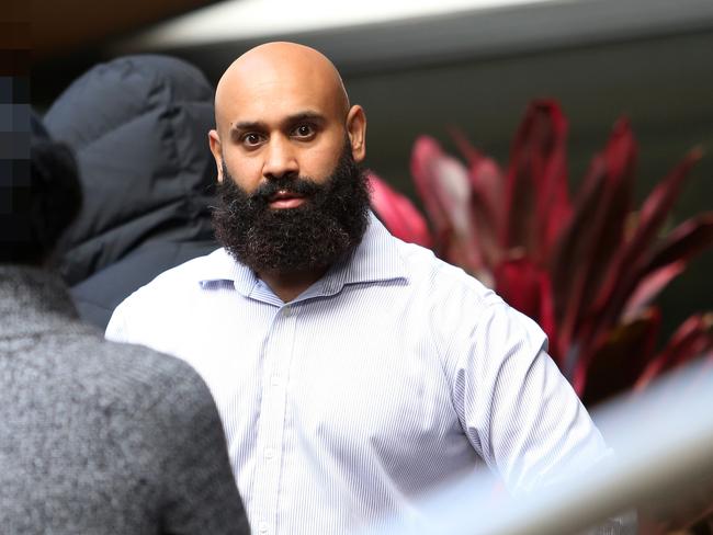 NEWCASTLE, AUSTRALIA - NewsWire Photos - May 6, 2021.  The Hayne supporter seconds after he spat out the front of Newcastle Court. Jarryd Hayne supporters clash with the media out the front of Newcastle Court after he was sentenced to 3 years 8  months.  Picture: NCA NewsWire / Peter Lorimer.