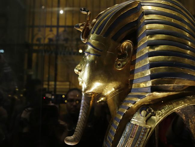 The gold mask of King Tutankhamun is seen in a glass case during a press tour, in the Egyptian Museum near Tahrir Square, Cairo, Egypt. Picture: Hassan Ammar