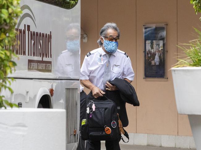 A United Airlines crew member is seen leaving the Novotel Hotel in Darling Harbour on December 3. Picture: Getty