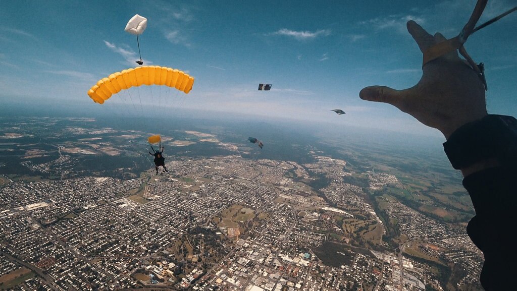 Brisbane radio host Stav Davidson dropped $10,000 in $5 notes during a skydive. Picture: Contributed