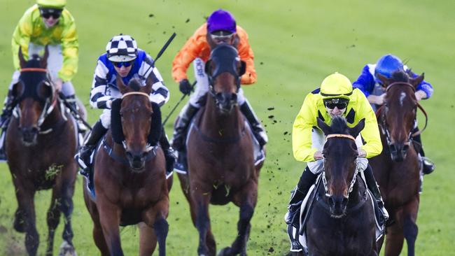 Danish Twist (lime green, black diamonds) wins the Listed June Stakes at Randwick. Picture: Jenny Evans.