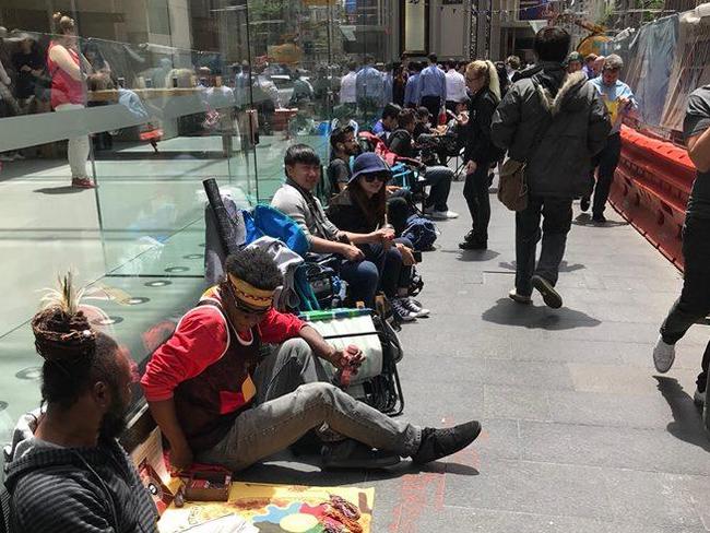 The line, which stretches around the corner, is often just empty seats. Picture: Marcus Barsoum.