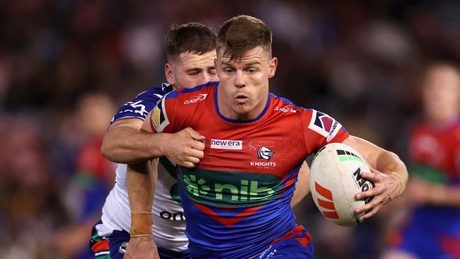 NEWCASTLE, AUSTRALIA - APRIL 09: Jayden Brailey of the Knights is tackled during the round six NRL match between Newcastle Knights and New Zealand Warriors at McDonald Jones Stadium on April 09, 2023 in Newcastle, Australia. (Photo by Cameron Spencer/Getty Images)