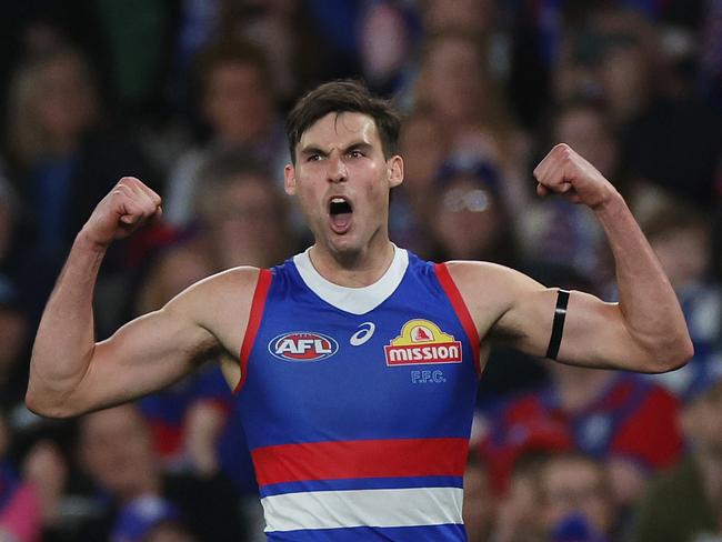 MELBOURNE, AUSTRALIA - AUGUST 18: Sam Darcy of the Bulldogs celebrates kicking a goal during the round 23 AFL match between Western Bulldogs and North Melbourne Kangaroos at Marvel Stadium, on August 18, 2024, in Melbourne, Australia. (Photo by Daniel Pockett/Getty Images)