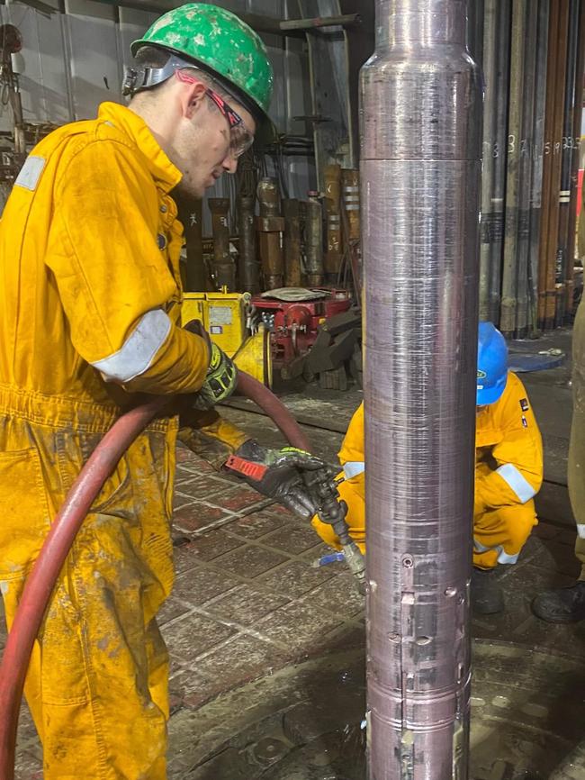 Jack Ford (green hard hat) works on an offshore oil rig, out from Broome in WA. Picture: Supplied