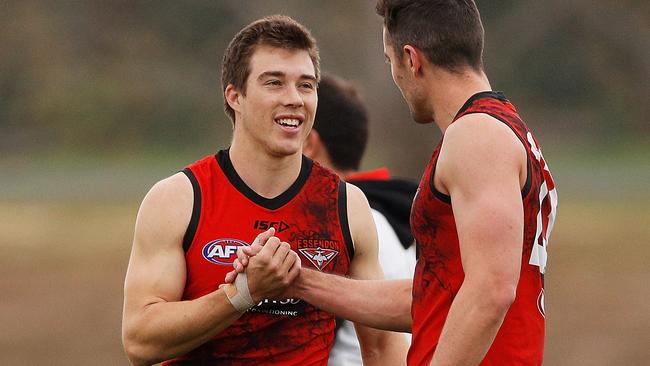 Zach Merrett and David Myers at Essendon training.