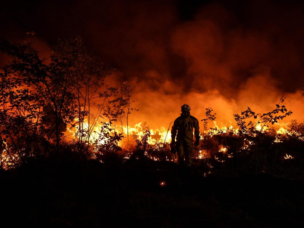 In the southwestern Gironde region, firefighters over the weekend continued to fight to control forest blazes that have devoured nearly 27,000 acres since July 12. Picture: AFP