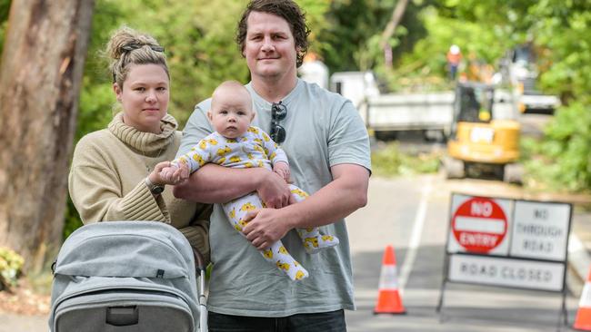 Kyra Middlemiss and her husband Daniel O'Rielly and baby Charlie are among of hundreds of residents of Stirling in the Adelaide Hills who are recovering from a devastating storm last Saturday. Picture: Brenton Edwards