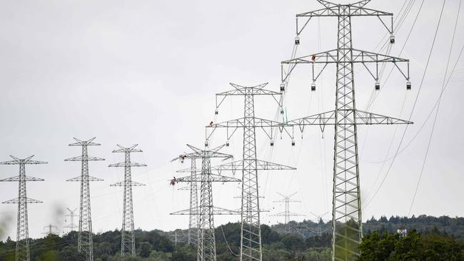 Transmission lines are critical to delivering Australia’s energy transition. Picture: Thomas Kienzle/AFP