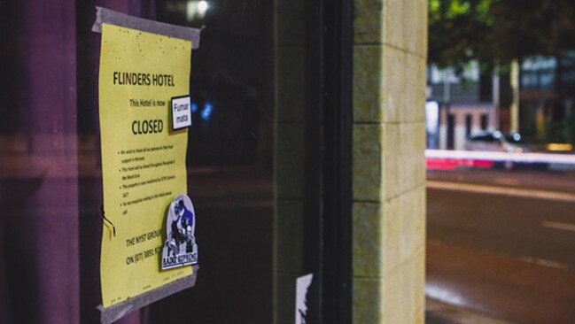 The video opens on the closure notice on the door on the Flinders Hotel.