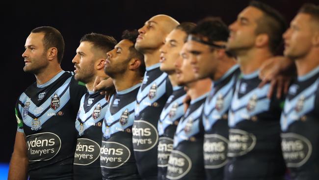 Blues players line up for the national anthem ahead of game two of last year’s series