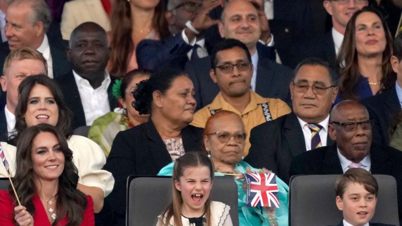 Princess Charlotte reacts as she watches the spectacular live concert. Picture: AFP