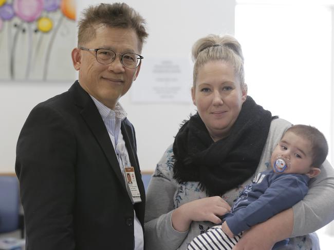 South Western Sydney Local Health District clinical director paediatrics and neonatology Dr Paul Chay and Oran Park resident Amanda Rogers with five-month-old son Liam in the Campbelltown Hospital paediatrics unit. Picture: Luke Fuda