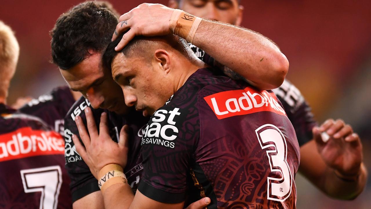 Kotoni Staggs celebrates scoring a try for the Broncos. Picture: Albert Perez/Getty Images