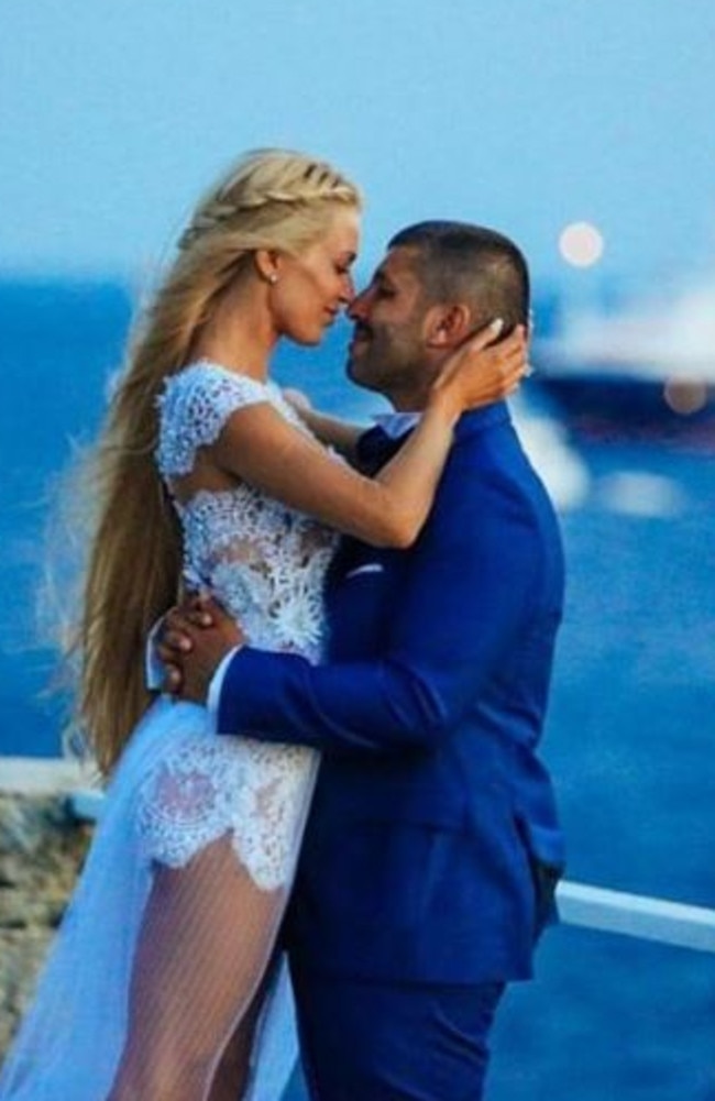 A loved up Viktoria Karida and John Macris at their 2016 wedding on the Greek island of Mykonos. Picture: Supplied
