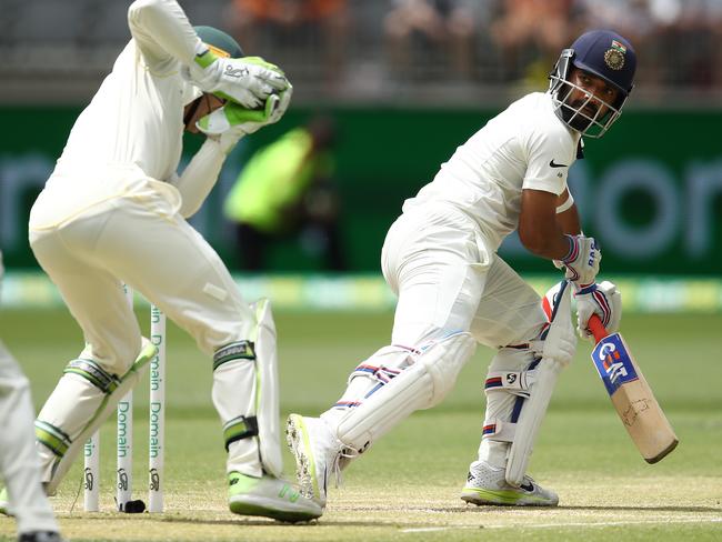 Tim Paine removes India’s Ajinkya Rahane off the bowling of Nathan Lyon in the second Test in Perth. Picture: Getty Images 