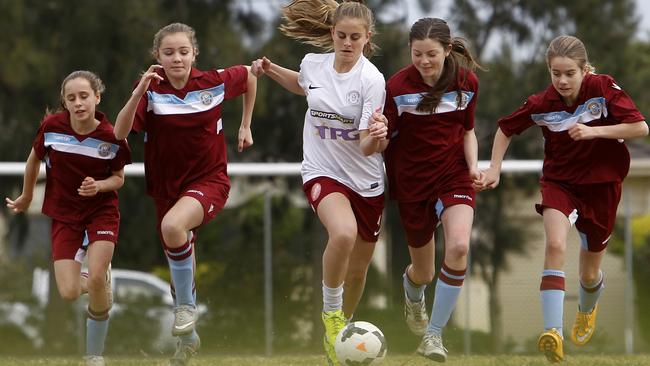 L-R: Charlotte Quinton, Isabella Saisanas, Emma Robers, Greta Jowettsmith and Sarah Greaves of Sandringham Soccer Club. Picture: Yuri Kouzmin.