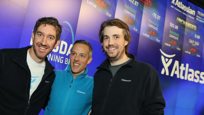 Atlassian co-founders Scott Farquhar and Mike Cannon-Brookes with President Jay Simons (middle) on the day the company listed on the Nasdaq exchange in the US in 2015.