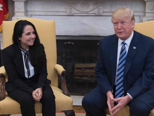 Freed aide worker Aya Hijazi with Donald Trump at the White House. Picture: AFP/Jim Watson