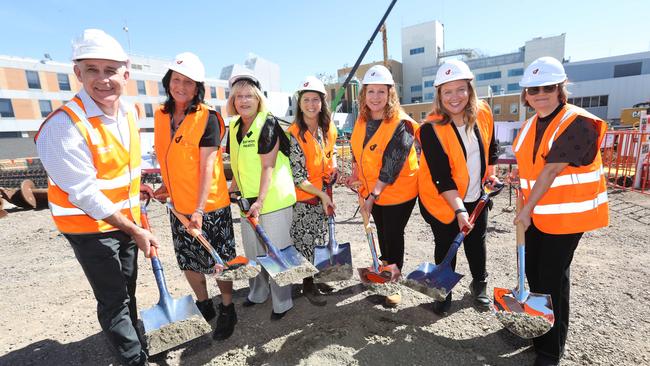 Paul Ritchie of Built, Geelong MP Christine Couzens, Barwon Health board director Lisa Neville, Bellarine MP Alison Marchant, Health Infrastructure Minister Melissa Horne, Lara MP Ella George and Priscille Radice of VHBA mark the commencement of the new hospital. Picture: Alan Barber