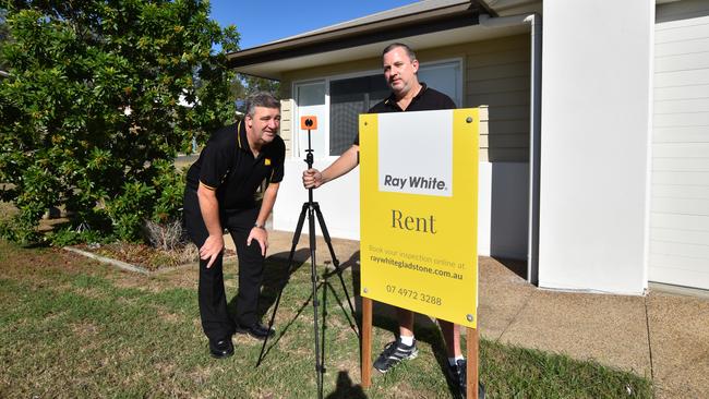 Ray White Gladstone brothers John and Jamie Fieldus set up for a 3D photo shoot at a rental property.