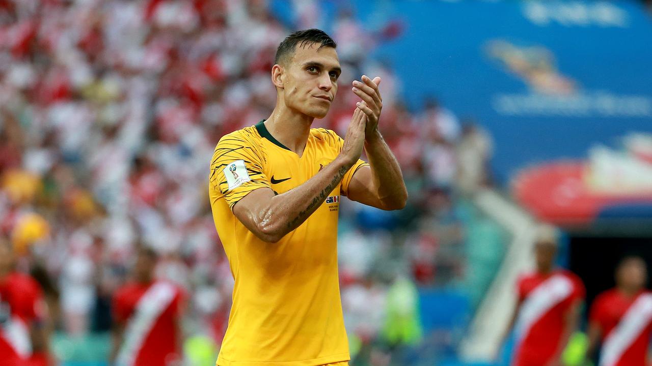Trent Sainsbury applauds the supporters.