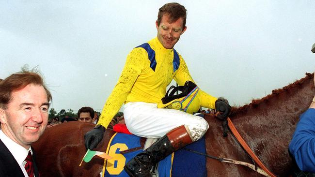 Trainer Dermot Weld with jockey Michael Kinane after Vintage Crop won the 1993 Melbourne Cup.