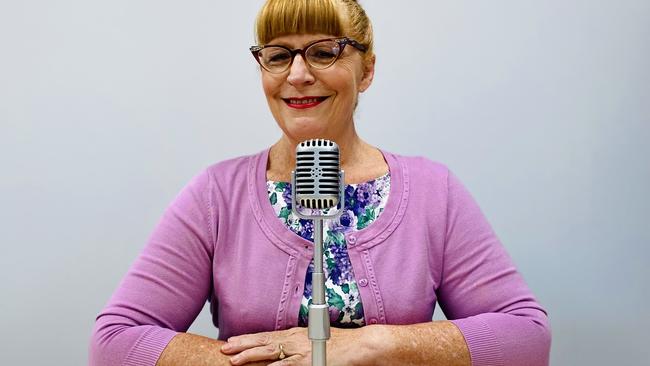 Author Victoria Purman in costume as a 1950s radio star