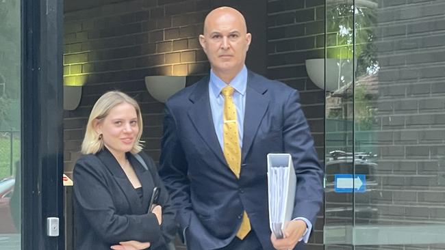 Katia Pearsall, 26, pictured with her lawyer Danny Eid appeared in Sutherland Local Court after Pearsall allegedly made 63 purchases totalling $1709.77 using a colleague’s credit card. Picture: Ashleigh Tullis