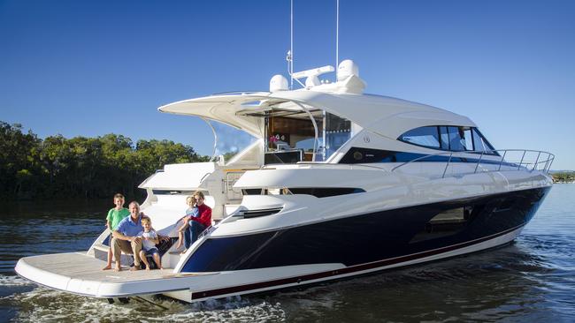 Rodney Longhurst aboard the Riviera 6000 sports cruiser with wife Ulrike and sons Jonas, Samuel and Bennett