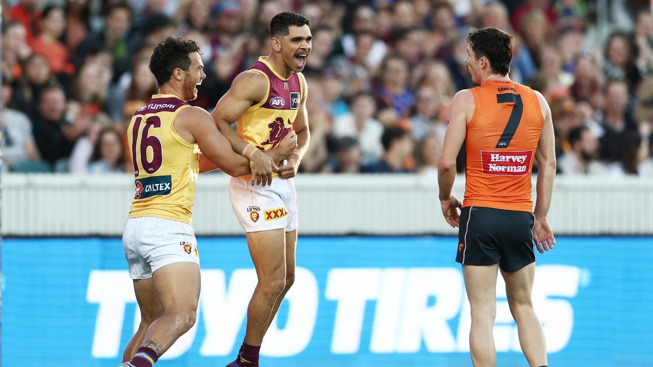 CANBERRA, AUSTRALIA – APRIL 22: Charlie Cameron of the Lions celebrates with team mates after kicking a goal during the round six AFL match between Greater Western Sydney Giants and Brisbane Lions at Manuka Oval, on April 22, 2023, in Canberra, Australia. (Photo by Matt King/AFL Photos/Getty Images)