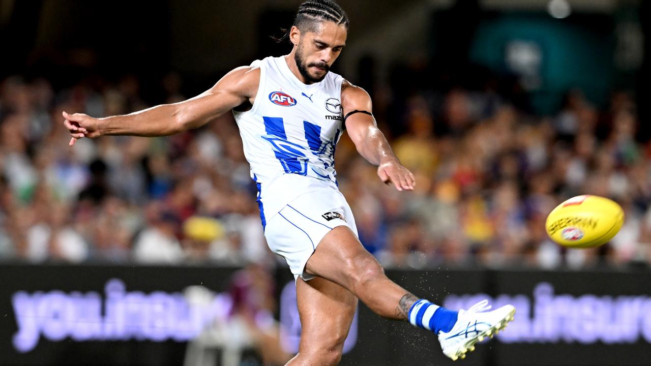 Aaron Hall gets his kick away but in most instances the Kangaroos were beaten to the ball by the Brisbane Lions. Picture: Getty Images