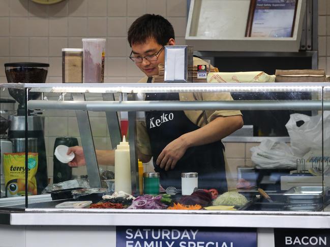 SYDNEY, AUSTRALIA : Newswire Photos - JANUARY 13 2025; A generic photo of a retail worker at a food takeaway shop in Sydney. Picture: Newswire/ Gaye Gerard