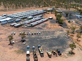 Trucks out on the ground at the Carmichael mine site.