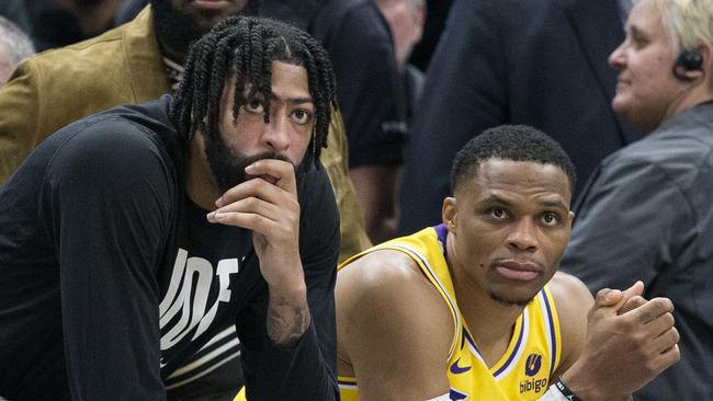 SALT LAKE CITY UT- NOVEMBER 7:  Austin Reaves #15, Kendrick Nunn #12, Anthony Davis #3, Russell Westbrook #0 and Lebron James #6 of the Los Angeles Lakers watch from the bench during the final seconds of their game against the Utah Jazz at the Vivint Arena November 7, 2022 in Salt Lake City Utah. NOTE TO USER: User expressly acknowledges and agrees that, by downloading and using this photograph, User is consenting to the terms and conditions of the Getty Images License Agreement (Photo by Chris Gardner/ Getty Images)