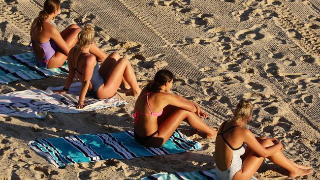 Monday morning and the sun worshippers are out at Manly Beach. Picture: Matrix