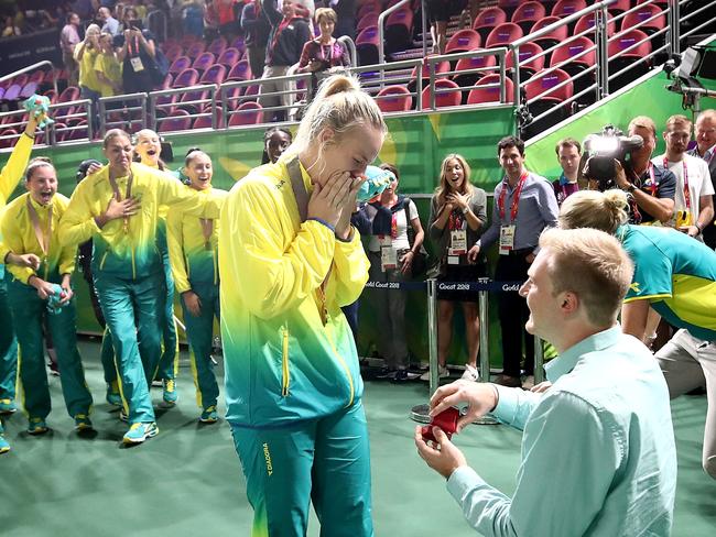 GOLD COAST, AUSTRALIA - APRIL 14:  Nicole Seekamp of Australia is proposed to by her partner following the Women's Gold Medal Game on day 10 of the Gold Coast 2018 Commonwealth Games at Gold Coast Convention Centre on April 14, 2018 on the Gold Coast, Australia.  (Photo by Hannah Peters/Getty Images)