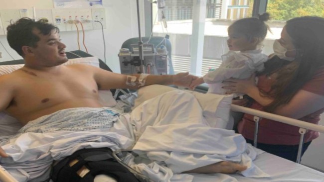 Mr Cheng in the hospital alongside a family member and his niece. Picture: GoFundMe
