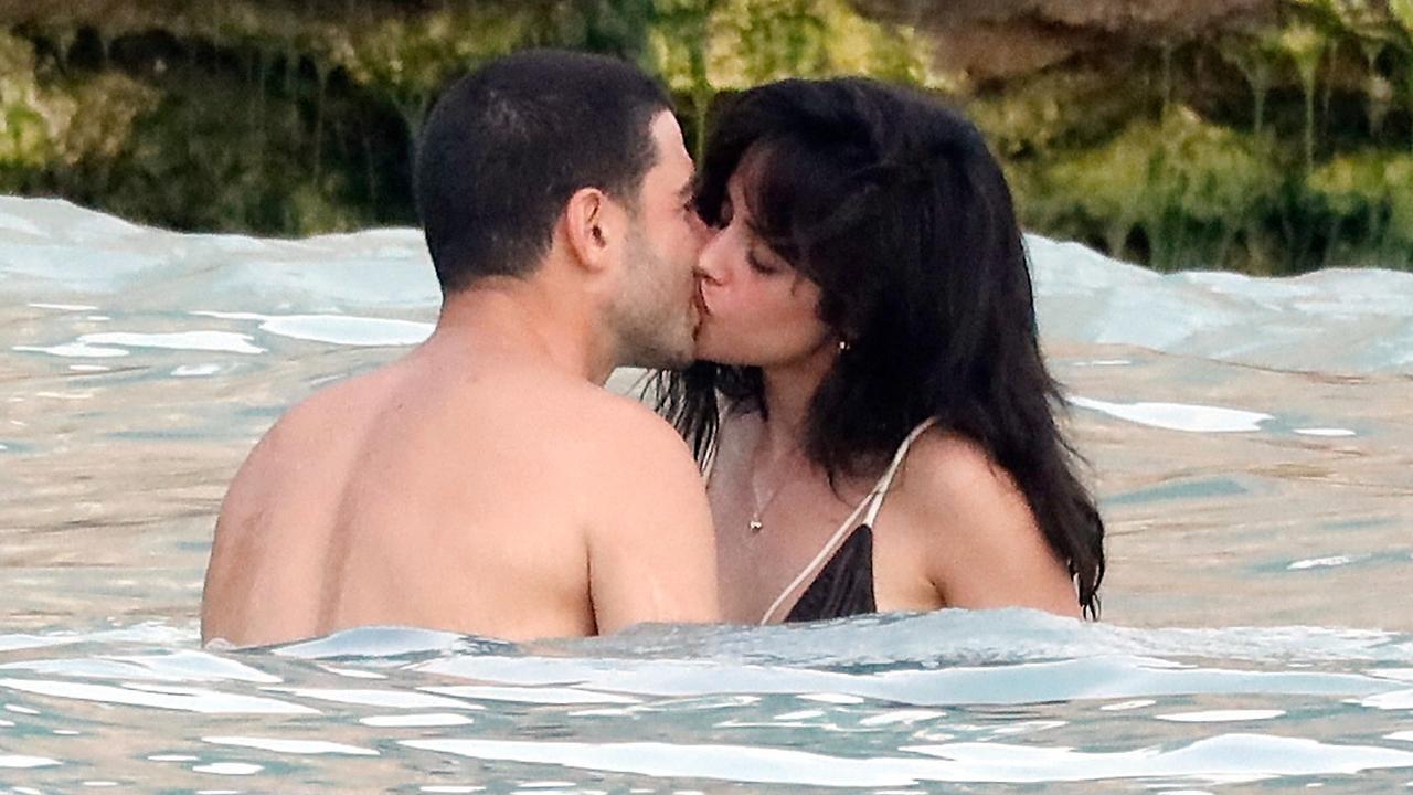 Pop star seen kissing billionaire boyfriend