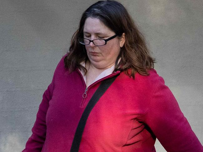 Flowers have been left at the front of her home. Erin Patterson arriving at her Leongatha home after three people died eating Death Cap mushrooms from a meal she had cooked. Picture: Jason Edwards