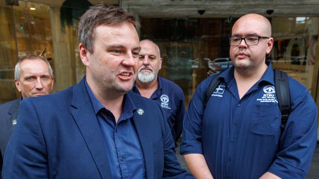 NSW Rail, Tram and Bus Union secretary, Toby Warnes and other organisers outside the Fair Work Commission on Friday. Picture: Justin Lloyd