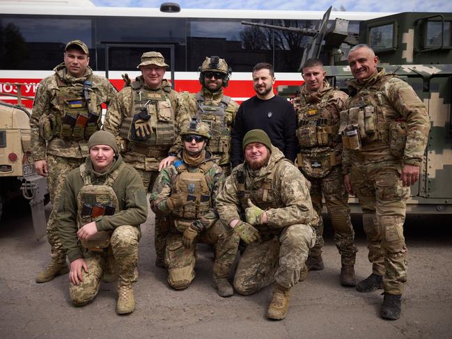 Ukrainian president Volodymyr Zelenskyy with servicemen during his visit at the heavily shelled frontline town of Avdiivka, Donetsk region. Picture: AFP