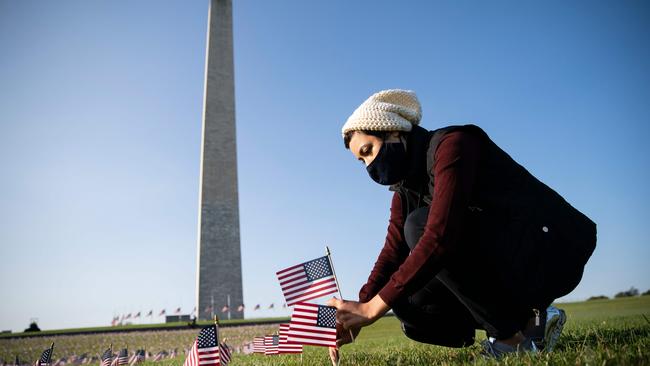 There are now 200,000 flags planted at the National Mall in Washington — one for every person who has died of COVID-19 in America. Picture: AFP