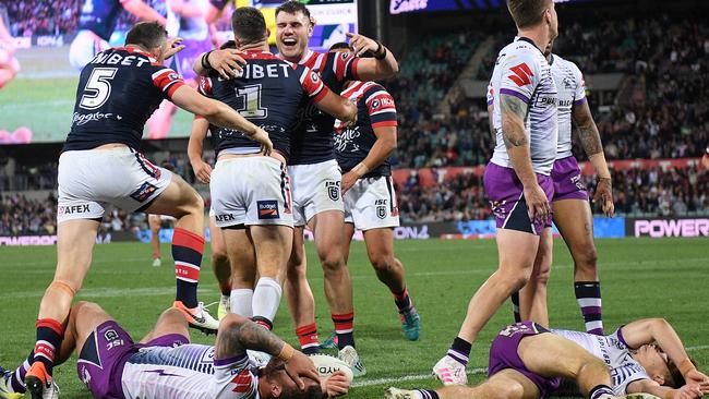 Tedesco leaves the Storm players feeling flat after grabbing the decisive try.