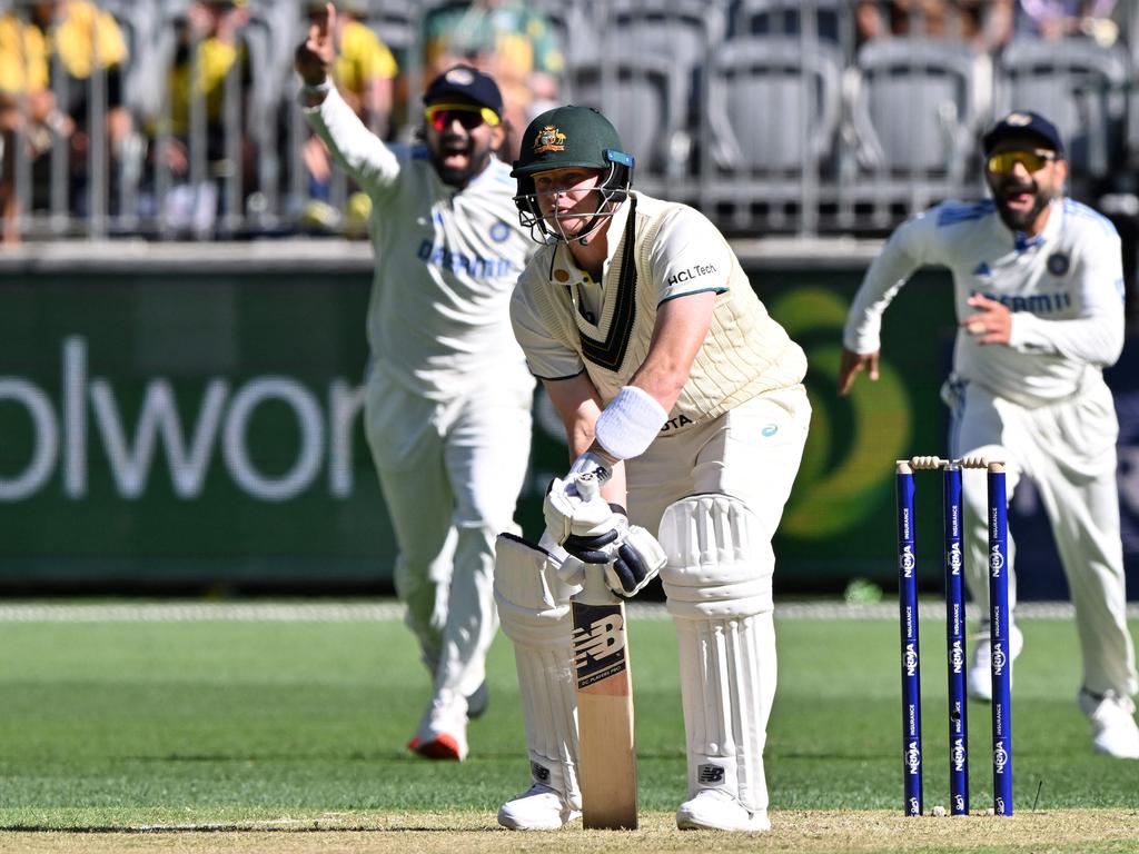 A moment Steve Smith will want to forget, a golden duck LBW. (Photo by SAEED KHAN/AFP)