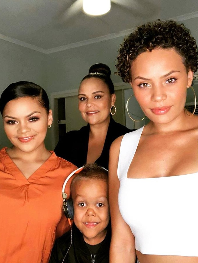 Quaden with his mum Yarraka (centre) and sisters Yilan (left) and Guyala (right)