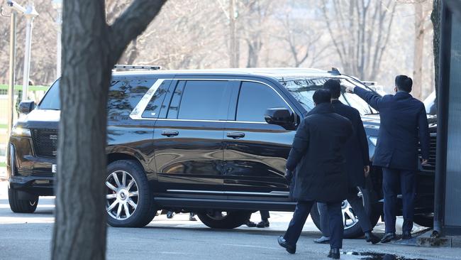 A vehicle believed to be carrying impeached South Korean President Yoon Suk Yeol arrives at the Corruption Investigation Office for High-ranking Officials after executing a warrant to detain the impeached president. Picture: Korea Pool/Getty