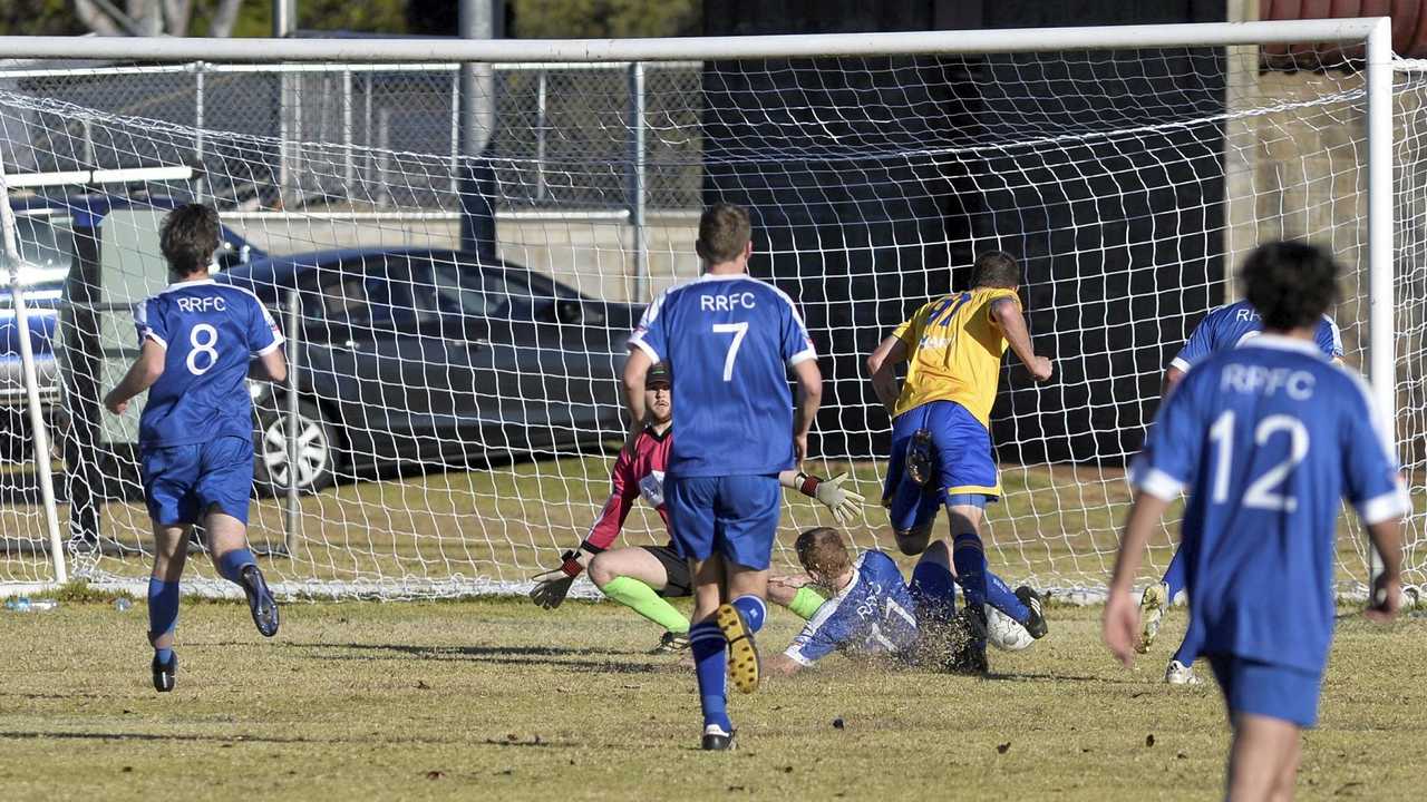 GOAL: USQ FC&#39;s Aaron Wieden scores the opening goal in his side&#39;s Toowoomba Football League premier men&#39;s game against Rockville. Picture: Kevin Farmer